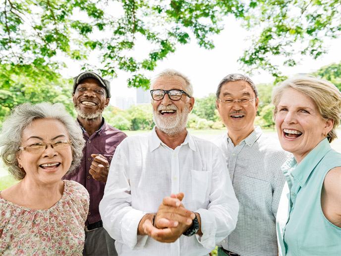 group of senior friends outdoors safe plan for retirement